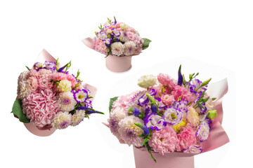 Pink and purple bouquet of flowers in a pink box isolated on white.