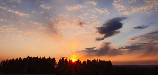 Wall Mural - Colorful sunset with beautiful natural abstract clouds
