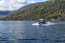 The NorthSilver PRO 745 Cabin Boat Of The Transport Police Is Patrolling The Waters Of Lake Teletskoye. Altai Republic