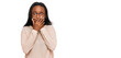 © Krakenimages.com - Young black woman wearing casual clothes and glasses shocked covering mouth with hands for mistake. secret concept.