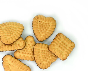 Wall Mural - Biscuits isolated on white. Chocolate cookies of different shapes isolated on white background.  