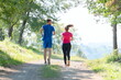© .shock - couple enjoying in a healthy lifestyle while jogging on a country road