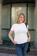 Wall Mural - White t-shirt streetwear women’s plus size fashion apparel outdoor shoot