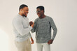 © prostooleh - Handsome black men standing on a white background