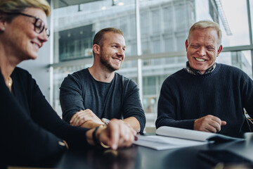 happy business people in a meeting