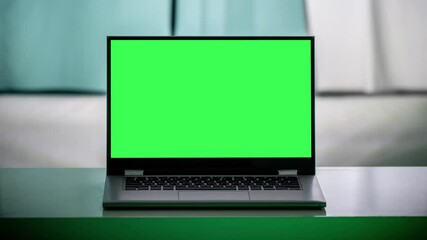Aufkleber - Working in the evening. Laptop with green screen. Zoom in. Template for keying 