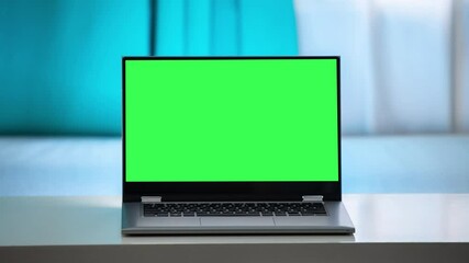 Aufkleber - Working in the evening. Laptop with green screen. Zoom in. Template for keying 