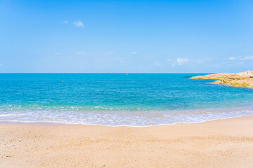 Wall Mural - Beautiful tropical beach sea ocean with white cloud and blue sky