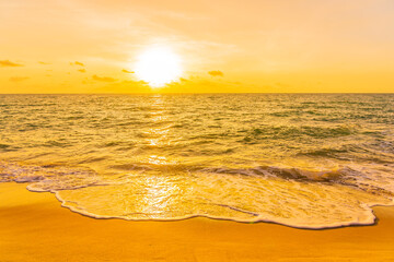 Wall Mural - Beautiful tropical beach sea ocean at sunset or sunrise time