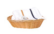 Towel in a basket isolated on white background