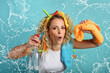 © alphaspirit - Funny housewife cleans and disinfects to keep germs, viruses and bacteria away.