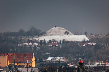 Wall Mural - Krakow old town photographed in March. Dynamic weather created interesting conditions for shooting.