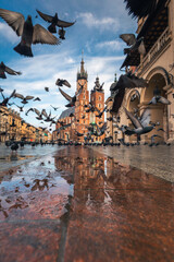 Wall Mural - Krakow old town photographed in March. Dynamic weather created interesting conditions for shooting.