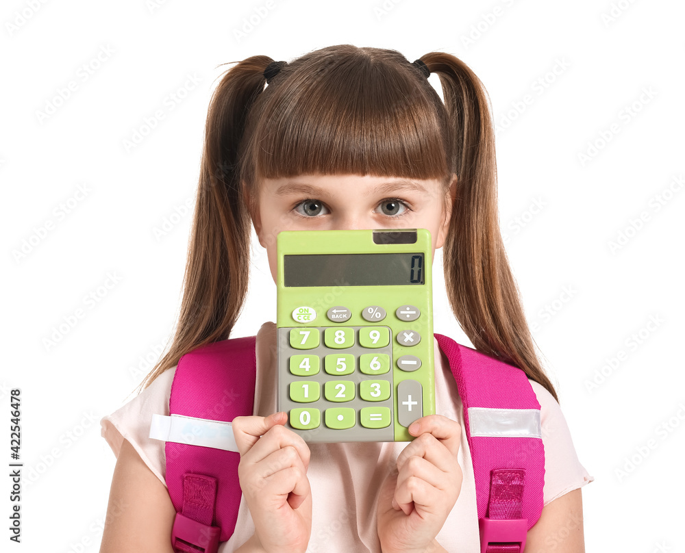 Little schoolgirl with calculator on white background