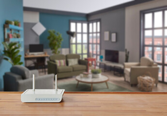 Wall Mural - Modem and router box on the table and living room background blur concept.