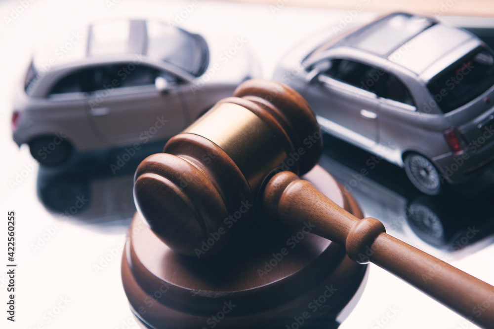Model of car and gavel. Accident lawsuit or insurance, court case. - obrazy, fototapety, plakaty 