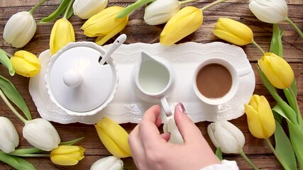 Wall Mural - Pouring milk into a coffee top view