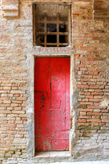 Wall Mural - Old red door to a house