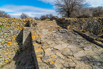 Wall Mural - Ruins and remains of ancient Greek Troy in the archaeological park of the ancient city of Troy near Canakkale, Western Turkey