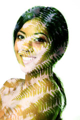 Leinwandbilder - Portrait of young beautiful smiling asian woman with summer fern leaves, double exposure. Beauty treatment, youth, nature concept