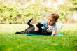 © oksix - Cute preschool girl play with pets on fresh grass