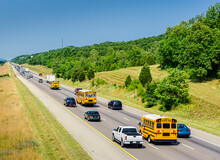 School Buses On The Highway ALL ID REMOVED