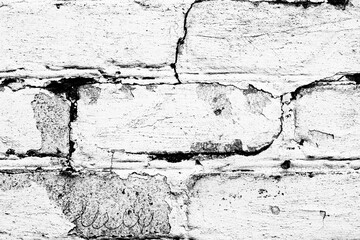 Texture of a brick wall with cracks and scratches which can be used as a background