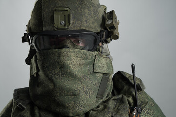 Wall Mural - Male in russian infantry protect uniform. Isolated on grey background.