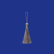 © Elena - Silver silk tassel isolated on blue background for creating graphic concepts