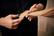 © Evgenia - Close-up of a female hairdresser cutting dry blonde hair tips. Beauty salon. Professional hair care.