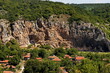 © vili45 - View of the beautiful village of Nisovo, Bulgaria, located below, above and in the high limestone cliffs, protected by magnificent deciduous trees