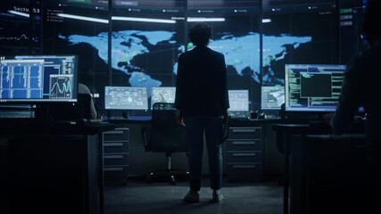 Aufkleber - Diverse Multiethnic Female IT Technical Support Manager with Short Hair Comes to Her Workplace in Monitoring Control Room Office with Big Digital Screens with Server Technical Blockchain Data.