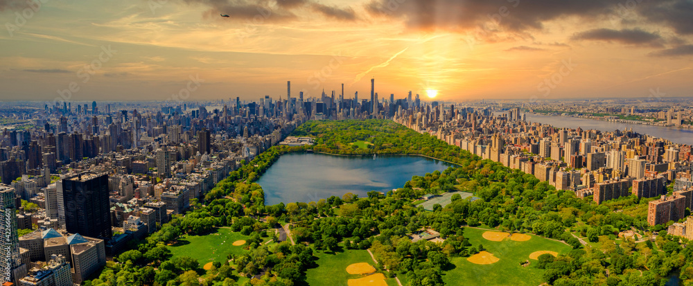 Central Park aerial view, Manhattan, New York. Park is surrounded by skyscraper. - obrazy, fototapety, plakaty 