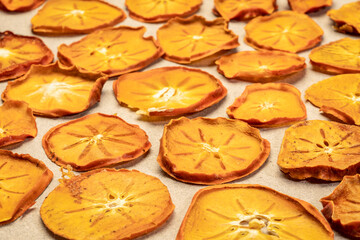 slices of dried persimmon fruit slices - fruit snack