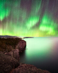 northern lights, aurora borealis display over lake superior, minnesota on the north shore, stunning 