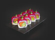 Sushi roll with fresh salmon, avocado and dragon fruit on the top