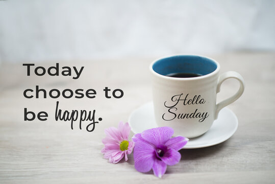 Wall Mural -  - Sunday inspirational quote -  Today choose to be happy.  With hello Sunday greeting on cup of morning coffee and purple orchid daisy flowers on white table background. Happy Sunday weekend concept.