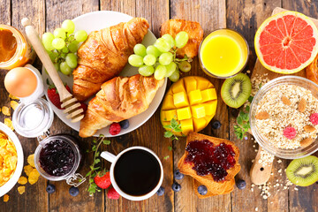 Wall Mural - continental breakfast- coffee cup,  croissant,  cereal and fruit