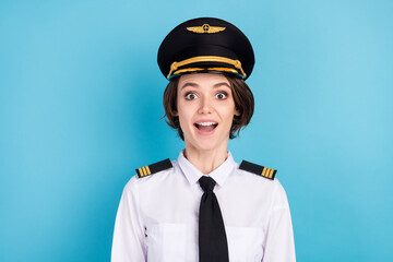 Canvas Print - Photo of charming amazed shocked young woman excited travel trip plane isolated on blue color background