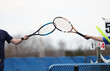 tennis racquet bumping displays sportsmanship after a match is over