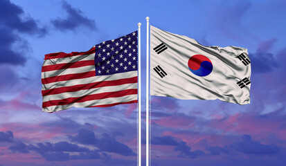 Wall Mural - South Korea and United States two flags on flagpoles and blue cloudy sky