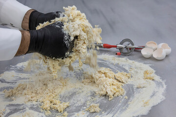 Wall Mural - Wheat flour, egg. Broken egg on flour isolated on white background.