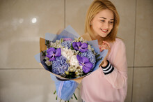 Great Floral Bouquet Of Different Fresh Flowers In Hands Of Smiling Blonde Woman