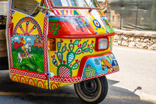 Amazingly Decorated Typical Apecar Or Three Wheels Car In Taormina, Italy