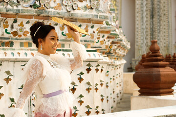 Woman in Thai Traditional Costume which is very Elite old Fashion