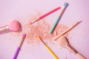 Poster - Make up brushes with powder on white background