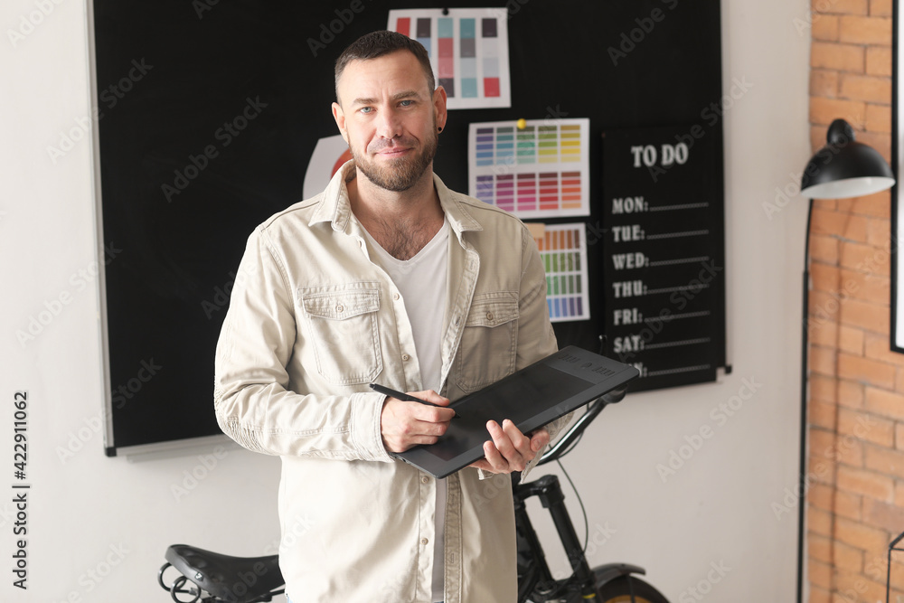 Male designer working in office