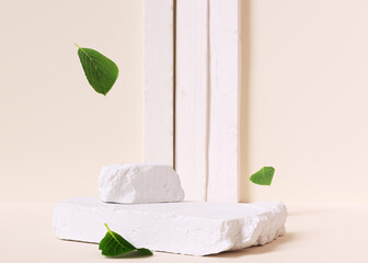Wall Mural - Natural organic cosmetic product presentation. Stone podium elements with green leaves falling. 3d rendering
