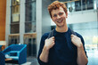 © Jacob Lund - Smiling student in university campus
