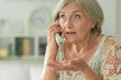 © aletia2011 - Portrait of upset senior woman calling doctor